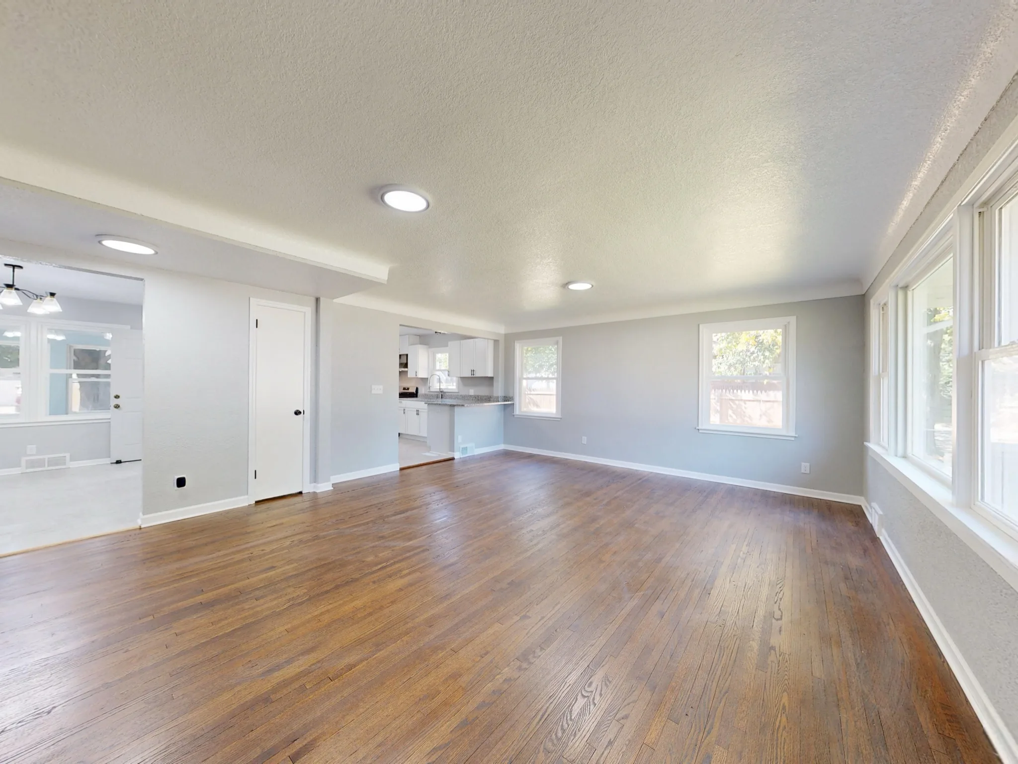 Empty living room · Before